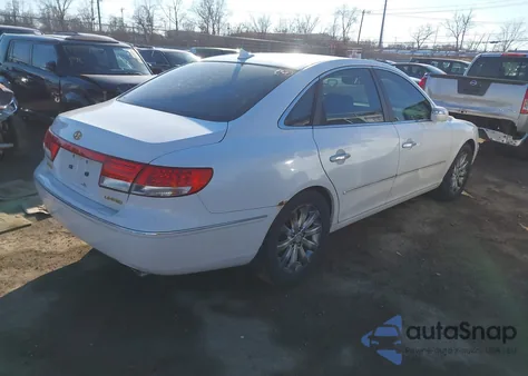 2009 Hyundai Azera Limited z USA, uszkodzony, nr VIN KMHFC46F09A374003